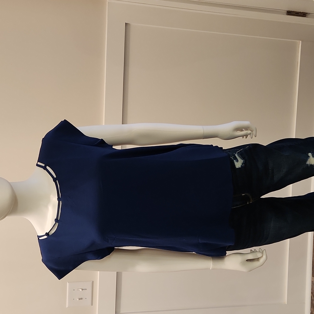 Navy blue flowy short sleeve top with neckline details